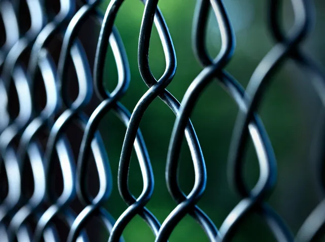 chain link fence, fence, steel fence, chain link, metal, barrier, security. Platform ban risks: the damage around the ban, and four moves that make it worse